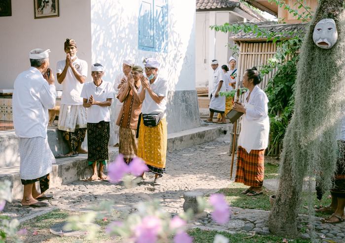 Balinese ceremony procession in white dress