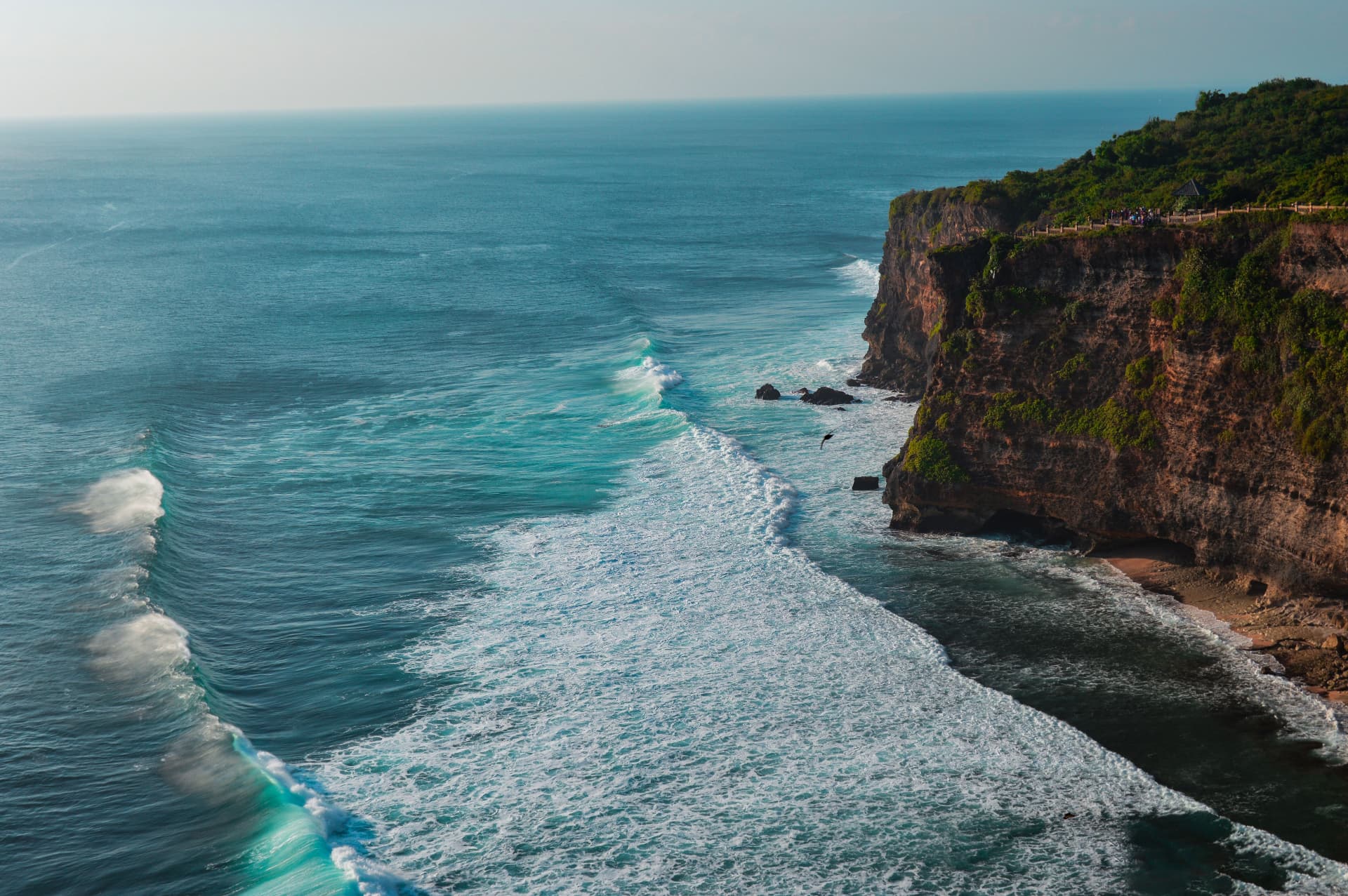 Waves breaking below the Uluwatu clifftop on the Bali coastline