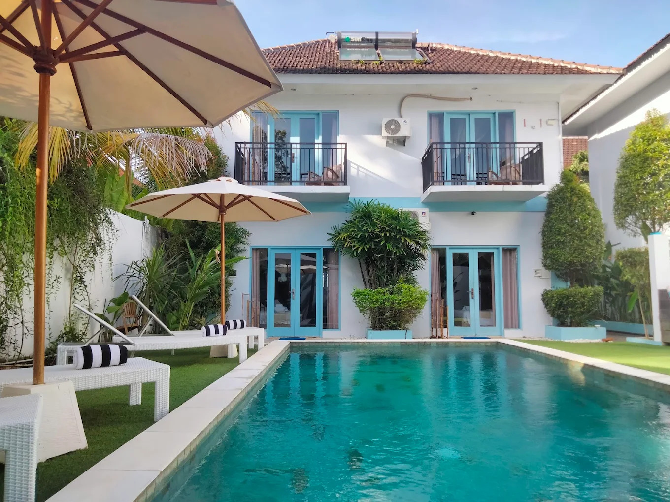 Gatsby Hotel turquoise pool and villa terrace
